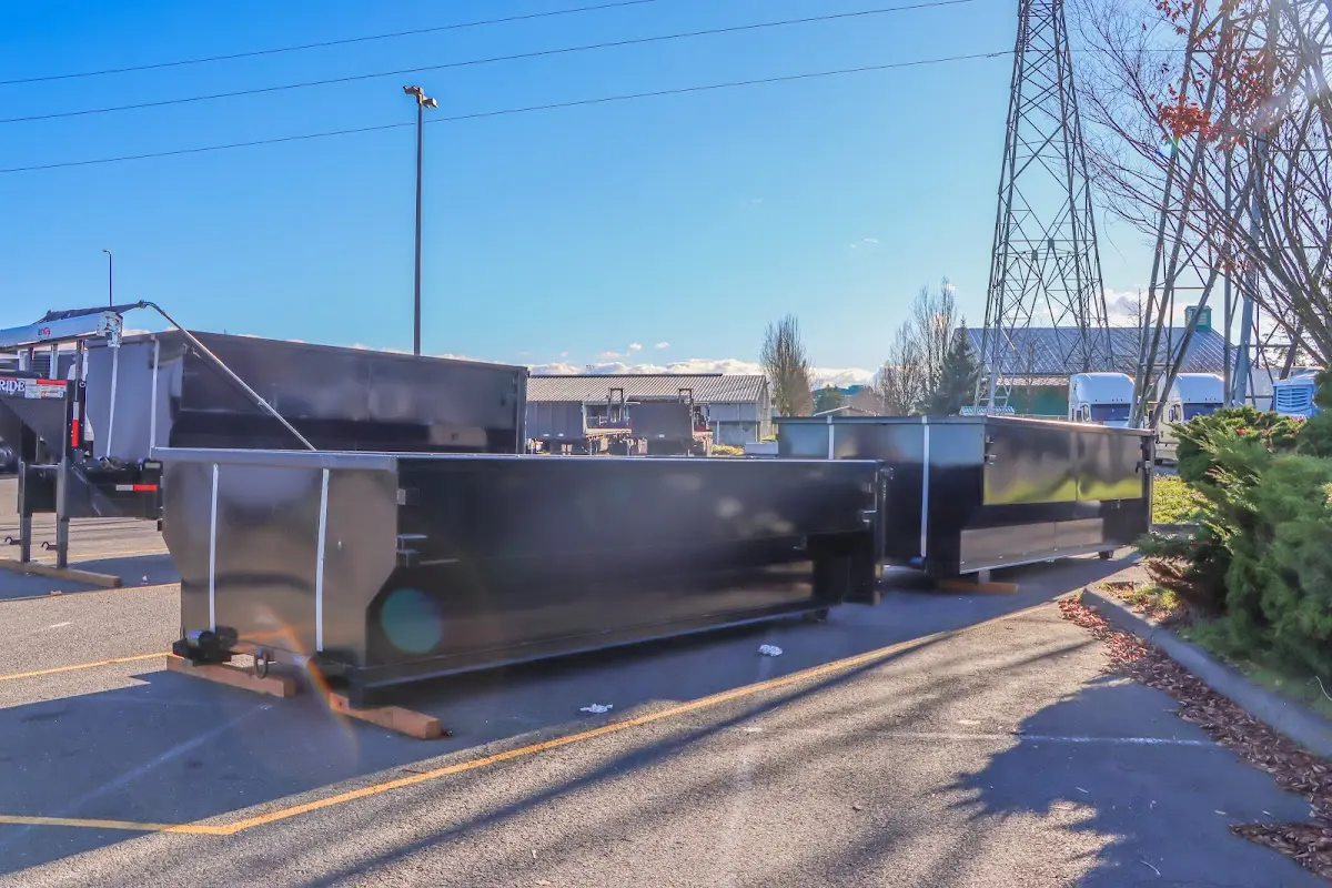 Roll-off dumpster ready for waste disposal at job site for Construction Dumpster Rental in Northampton